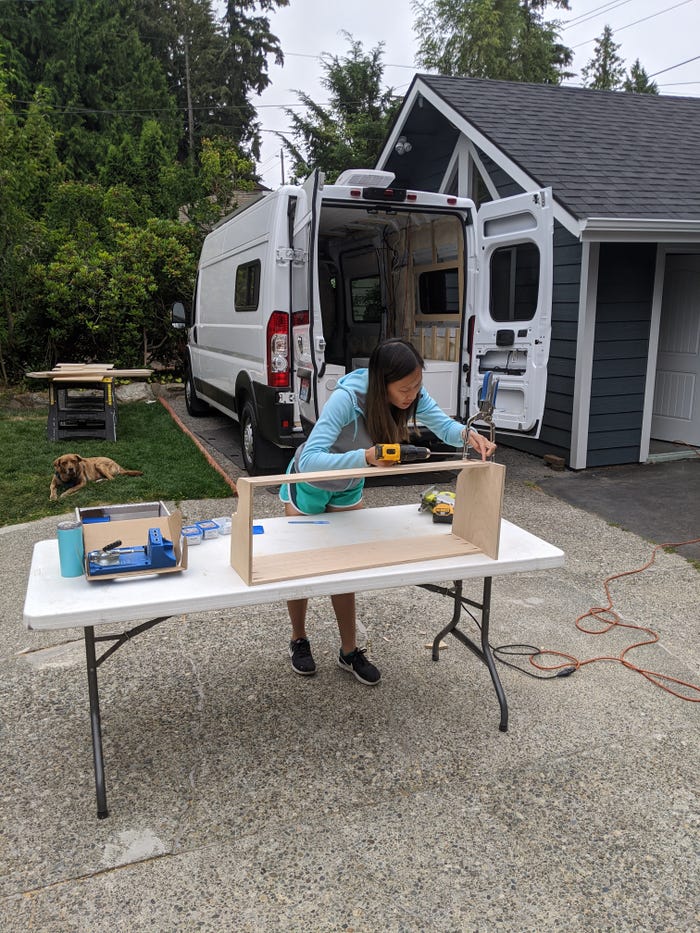 Reid's wife working on the original van