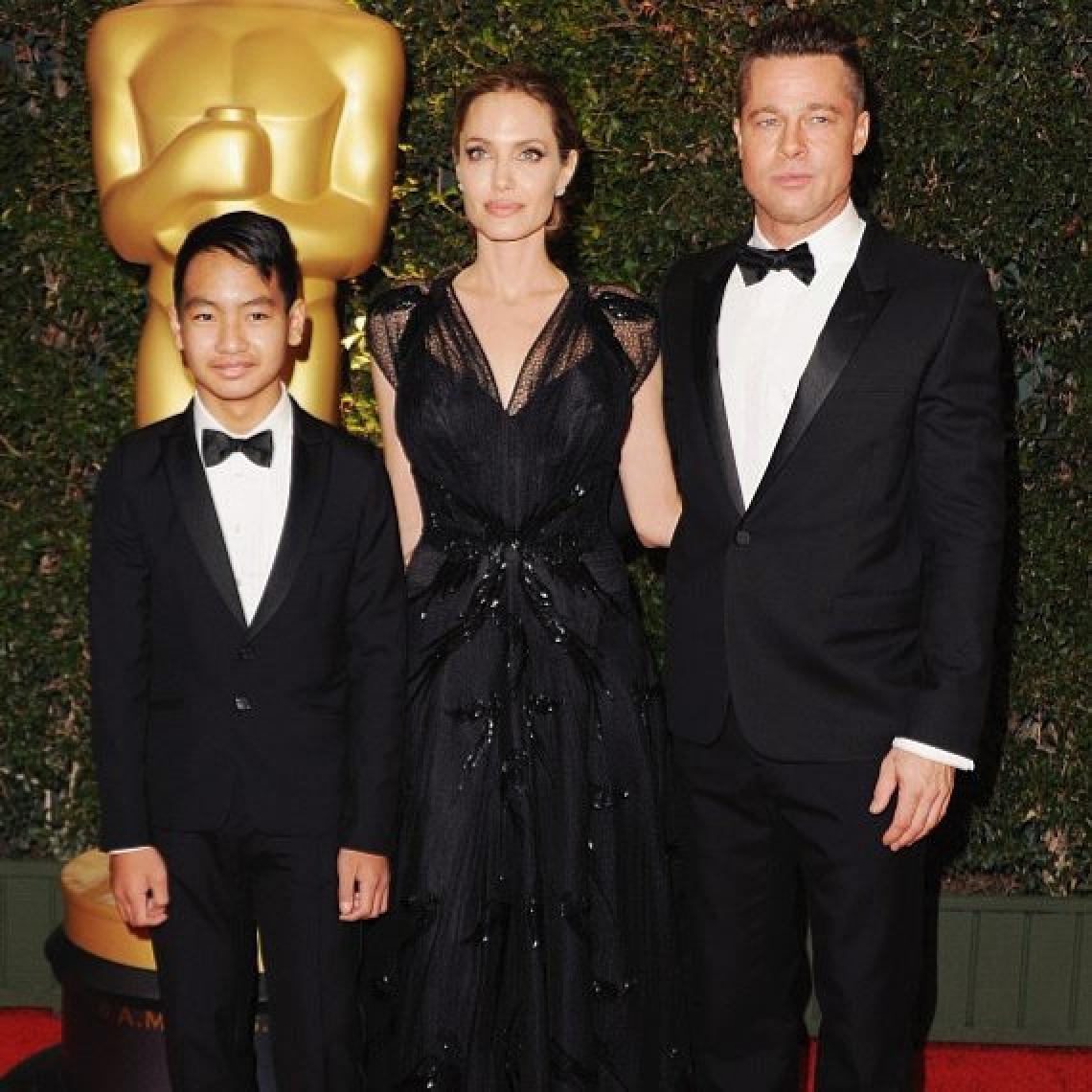 Maddox Jolie-Pitt and his parents Angelina Jolie and Brad Pitt. Photo: @maddoxjoliepitt.fans/Instagram