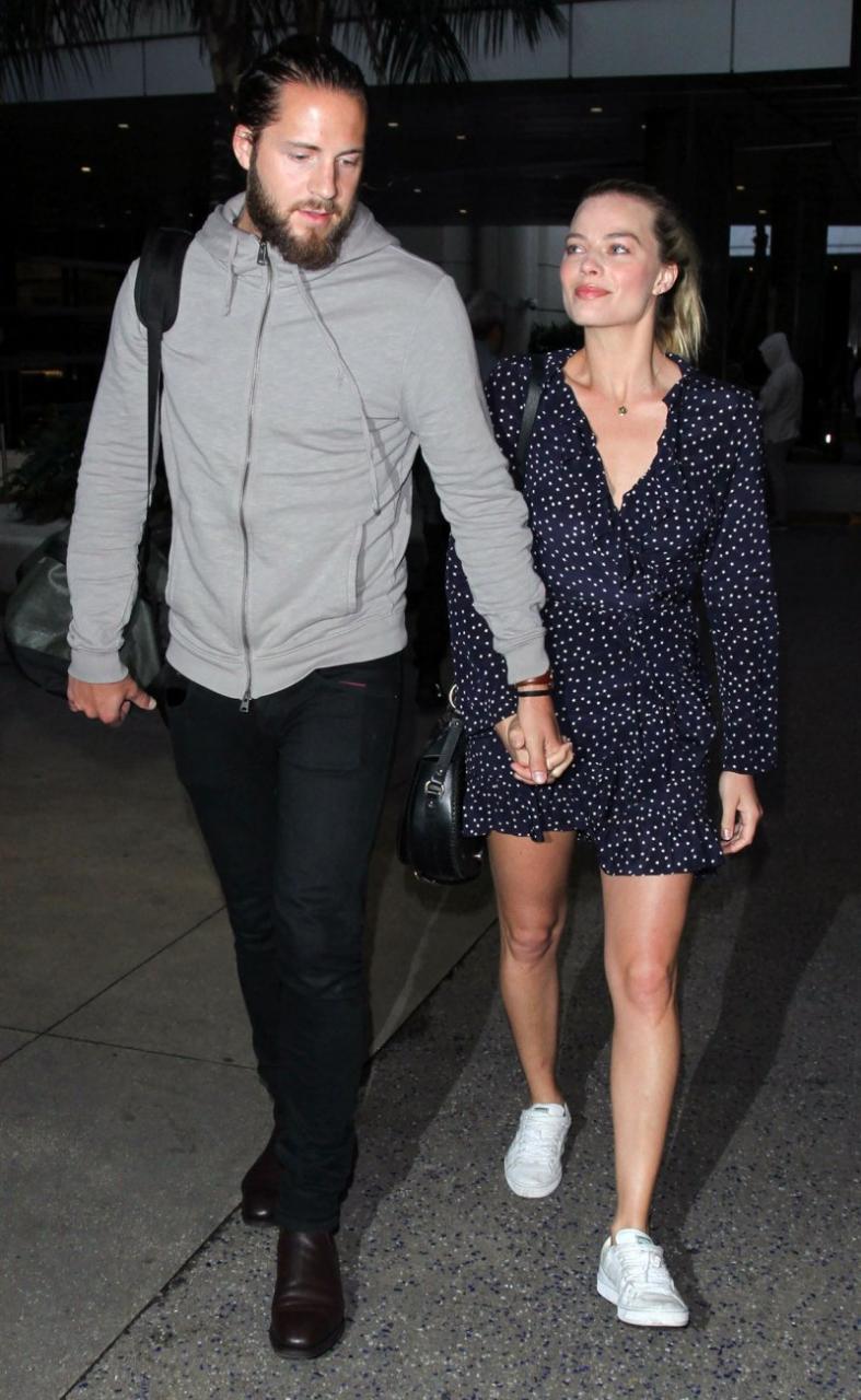 Margot Robbie and Husband Tom Ackerley's Relationship Timeline: Inside Their Low-Key Marriage white sneakers