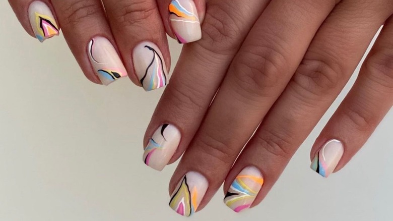 Neon accents on white nails