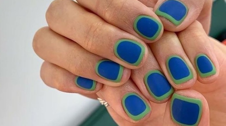 Blue nails with a green outline